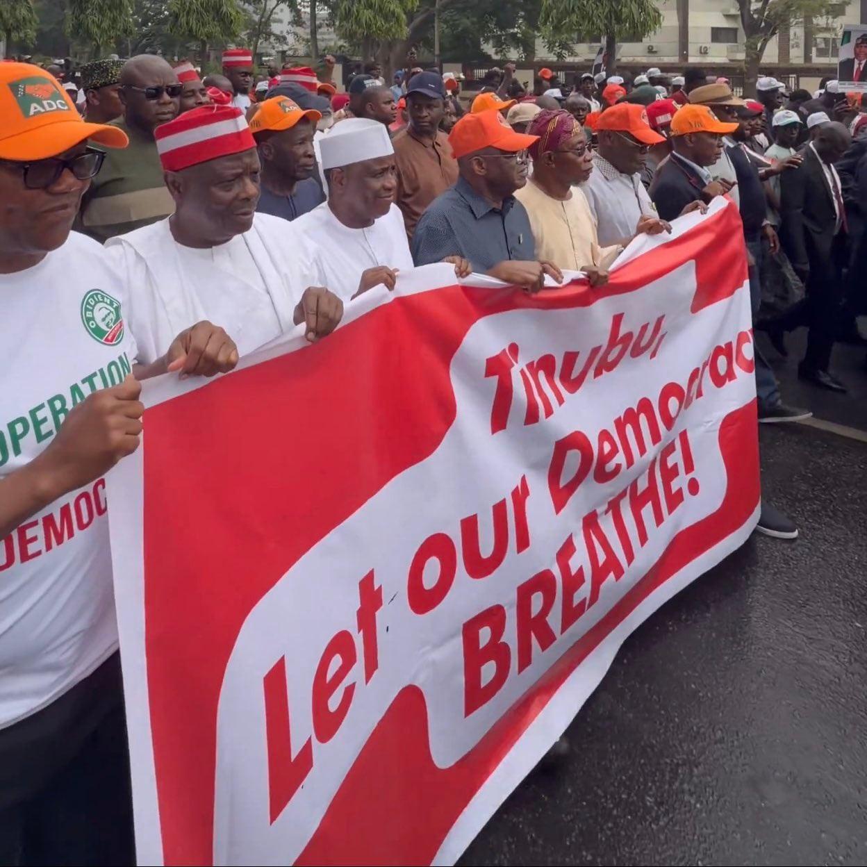 BREAKING: ADC MEMBERS STAGE MASS PROTEST IN ABUJA, DEMAND INEC CHAIRMAN’S SUSPENSION AND RECOGNITION OF DAVID MARK AS NATIONAL CHAIRMAN